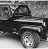 Bushwacker 10903-11 Black Extend-A-Fender Style Smooth Finish 4-Piece Fender Flare Set for 1987-1995 Jeep Wrangler (Excludes Renegade)