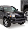 Bushwacker 31920-02 Black Pocket/Rivet Style Smooth Finish 4-Piece Fender Flare Set for 2005-2011 Toyota Tacoma w/73.5 In. Bed