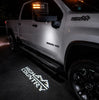 Customs Unlimited High Country Logo LED Puddle Lights For 2017-2027 Chevy Silverado High Country
